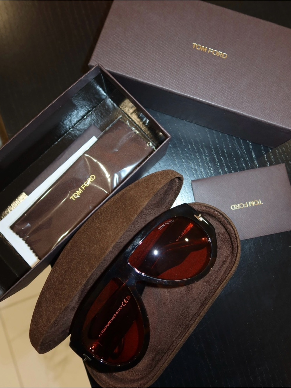 Tom Ford Black Frame Sunglasses with Red Lenses